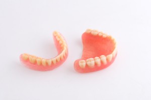 52682668 - full denture on white background